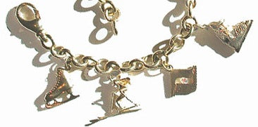 Female Skier Charm
